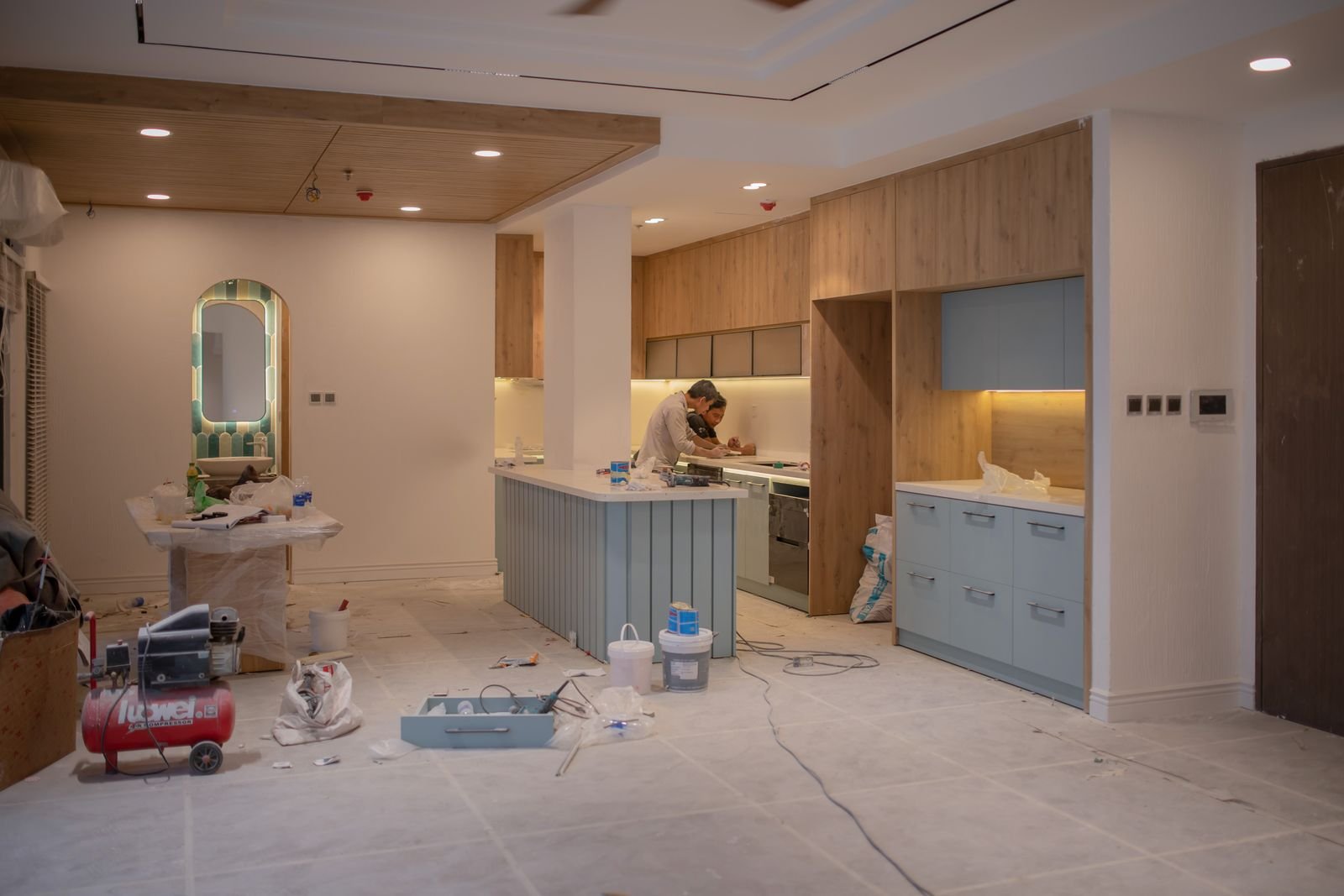 Kitchen renovation in progress with new cabinets being installed